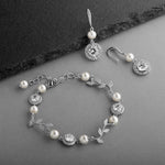 Load image into Gallery viewer, Pearl And Cubic Zirconia Bracelet and Earrings Set
